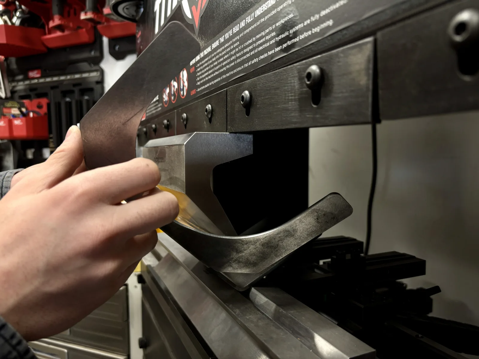 Sheet metal being bent on the press brake in the Arinta Engineering shop